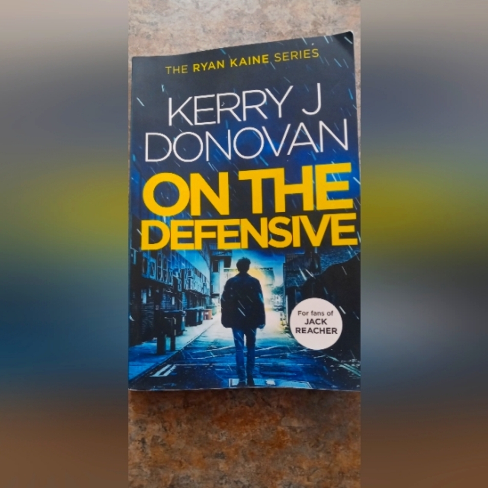 Kerry J Donovan On The Defensive - Blue & Yellow Paperback